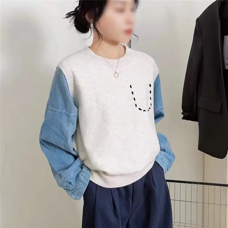 牛仔袖拼接假两件套头毛衣女2025年秋冬新款简约宽松圆领针织上衣