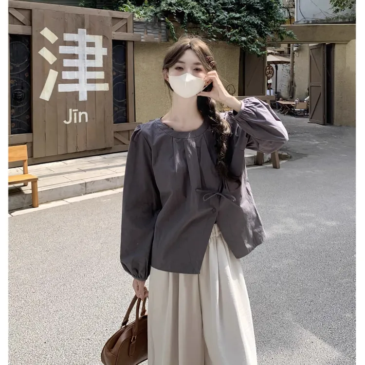 十三行秋季新款法不对称开叉蝴蝶结长袖衬衫女减龄别致小个子上衣