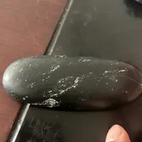 和田玉手把件黑青