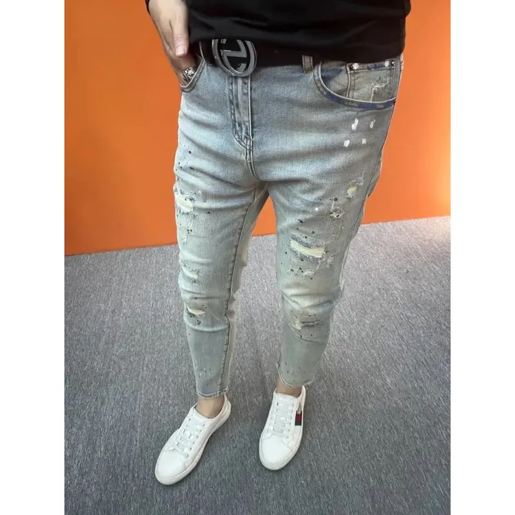 休闲新款九分破洞牛仔裤修身小脚裤时尚夏季点漆水洗男牛仔裤子