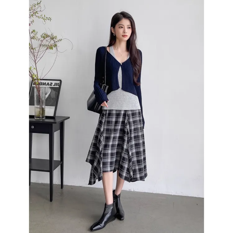 不规则格子a字半身裙女2025新款早秋季设计感气质高腰中长款裙子