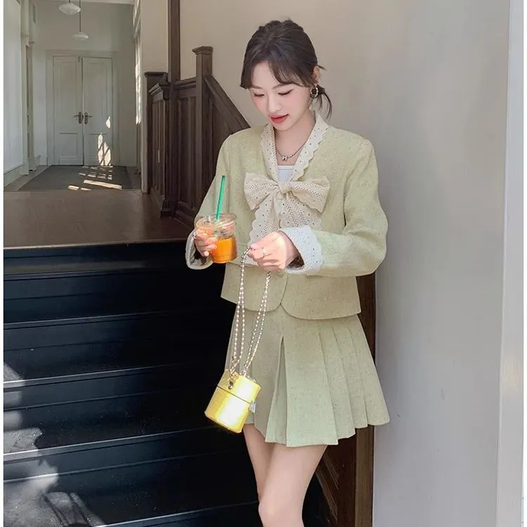 黄色法式减龄两件套女2025秋季新款蝴蝶结系带西装外套百褶裙套装