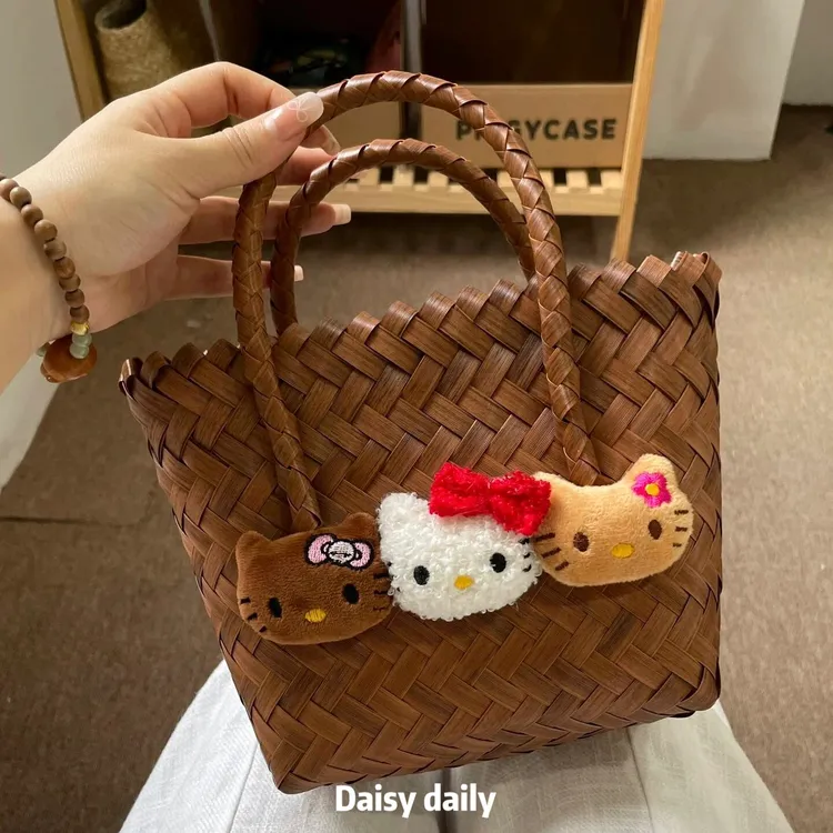 新款小众黑皮kitty高颜值仿藤编编织手提包ins风轻便携式出游小包