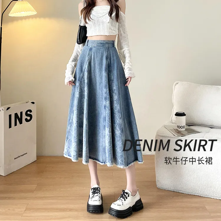 高腰毛边牛仔半身裙女秋季薄款2025新款松紧腰休闲显瘦a字中长裙