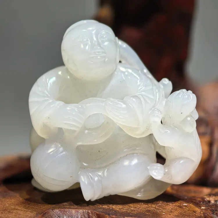 和田玉童子戏猫手把件