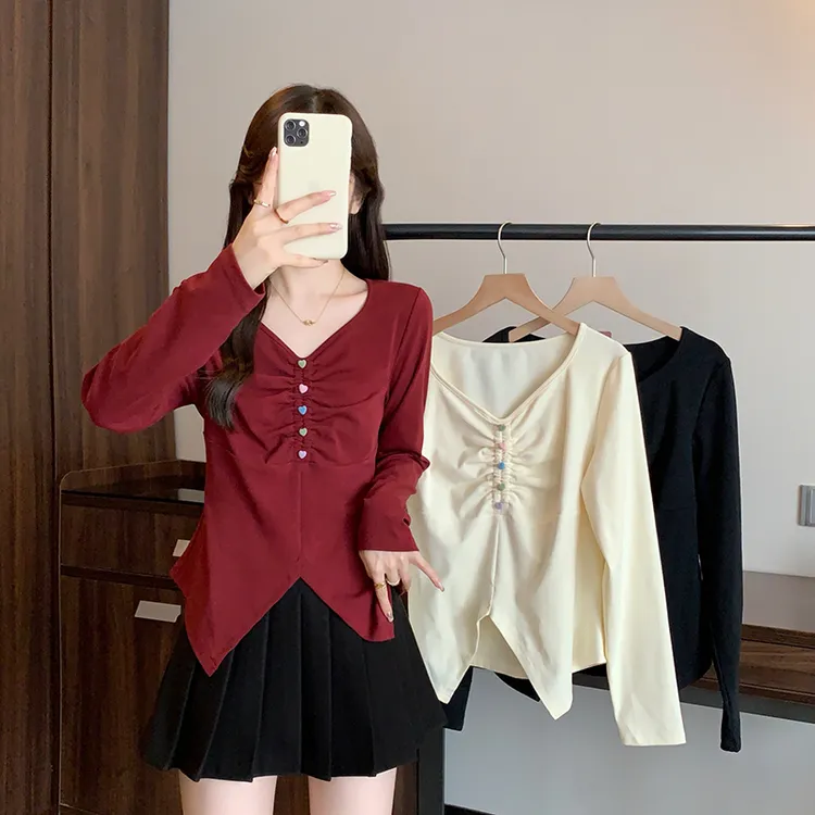 2025秋装新款胖mm大码女甜美v领爱心彩色纽扣不规则长袖上衣A2127