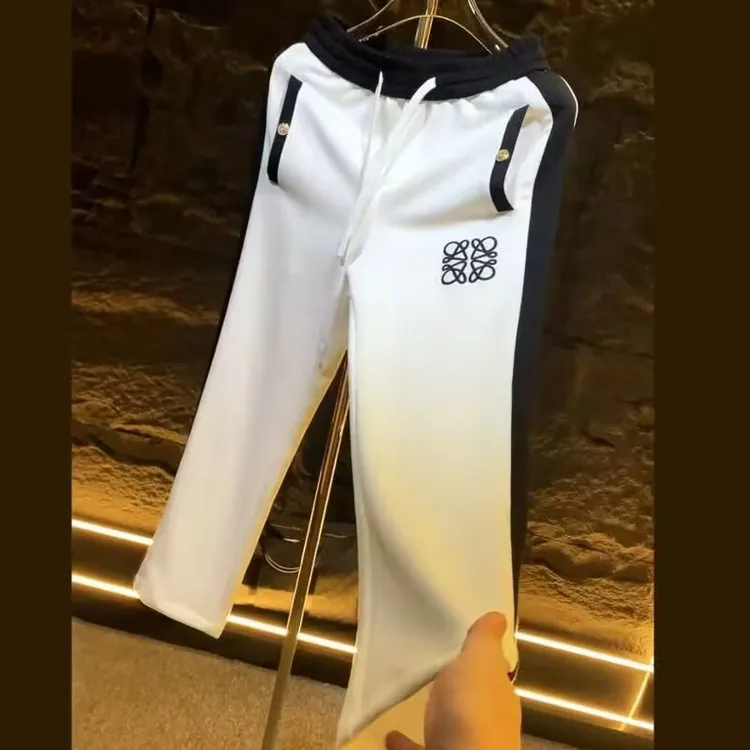 潮牌高奢时尚拼接秋季中弹力休闲直筒宽松潮流百搭男士刺绣长裤
