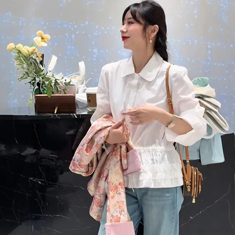 法式蓬松花瓣下摆娃娃领长袖女2025春秋新款白色花边衬衫叠穿上衣