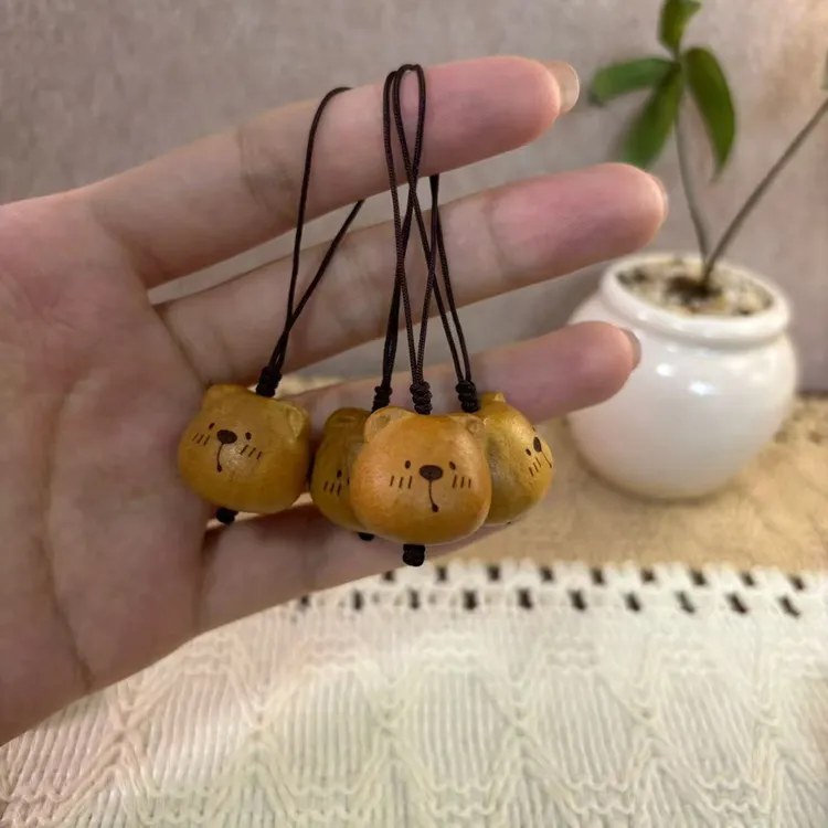桃木鼻涕熊手机挂件包挂