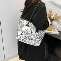 涂鸦帆布包包女2025新款休闲单肩包百搭大容量学生上课通勤托特