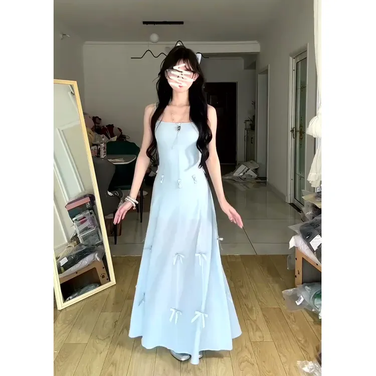设计感吊带连衣裙2025春夏新款法式气质重工蝴蝶结收腰中长款裙子