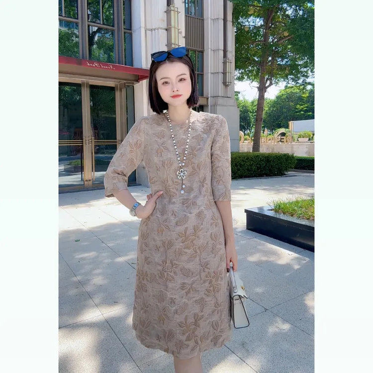 25秋冬新款圆领金色树叶提花A字版中长款显瘦连衣裙