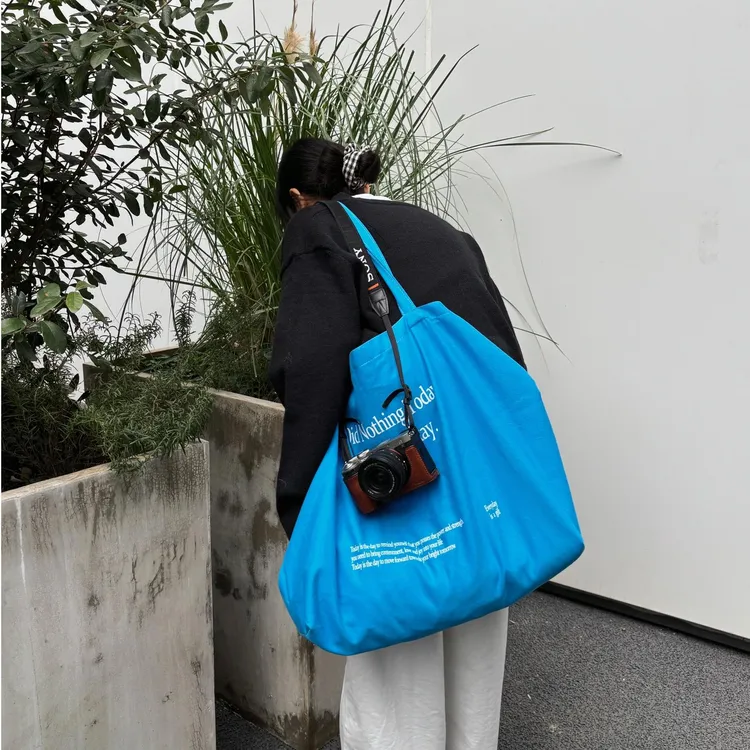 2025新款小众设计大容量松弛感蓝色帆布包百搭通勤单肩手提托特包