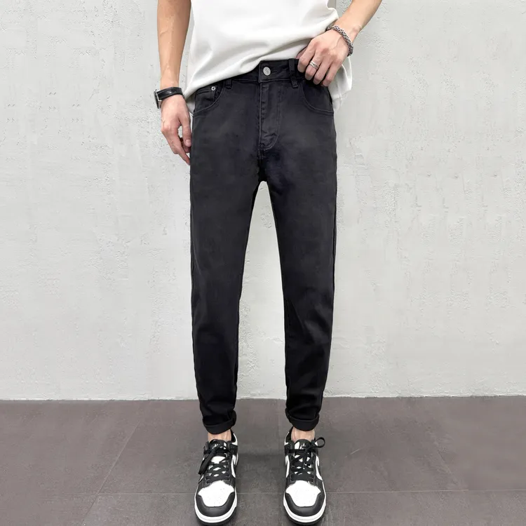 秋冬男款黑色牛仔裤爆款2025新款黑色休闲潮流弹力男士修身小脚裤