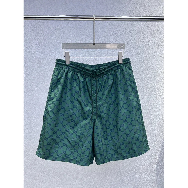 全新未使用Gucci古驰 787913 双G满logo花纹男士绿色休闲沙滩短裤