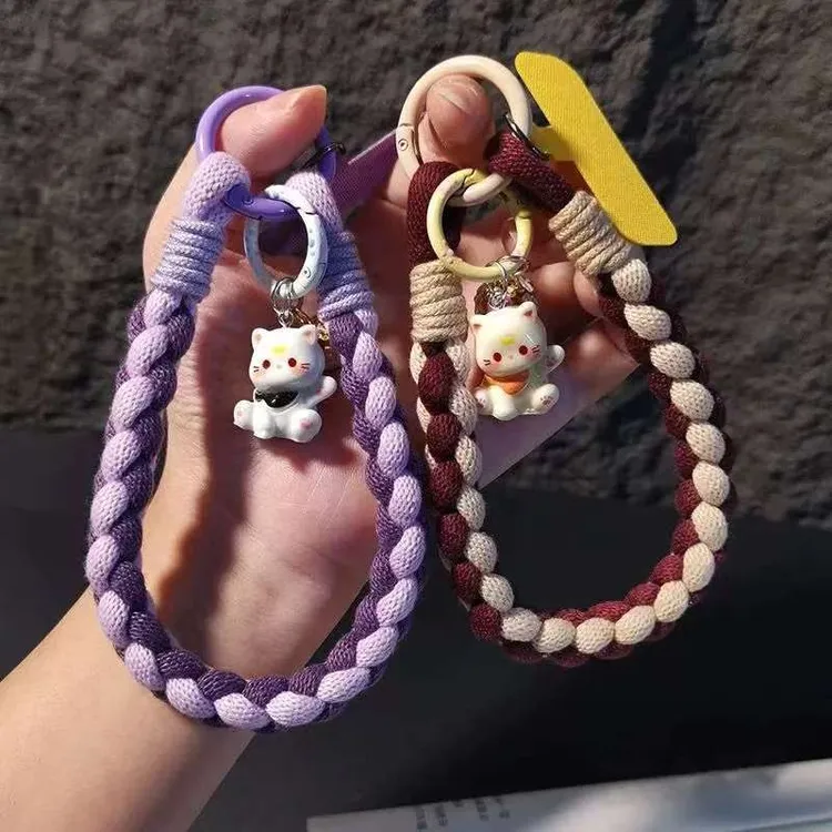 手机挂绳手腕短款撞色编织卡通花铃吊坠户外旅游防盗吊绳手机壳套
