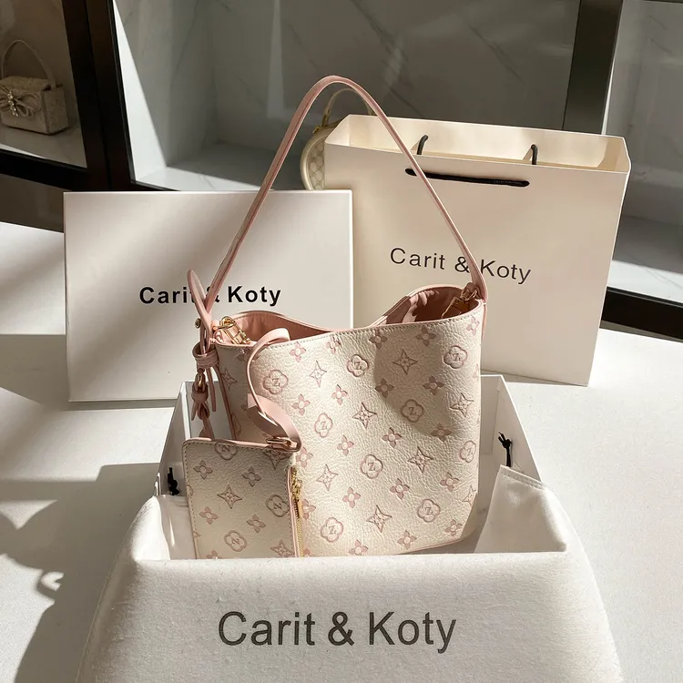 CARIT KOTY小众高级感粉色水桶包包女爆款2025新款上班通勤手拎包
