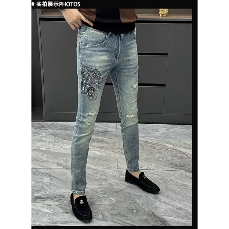 高级烫钻牛仔裤男欧货潮牌破洞修身小脚弹力时尚帅气裤子2025新款