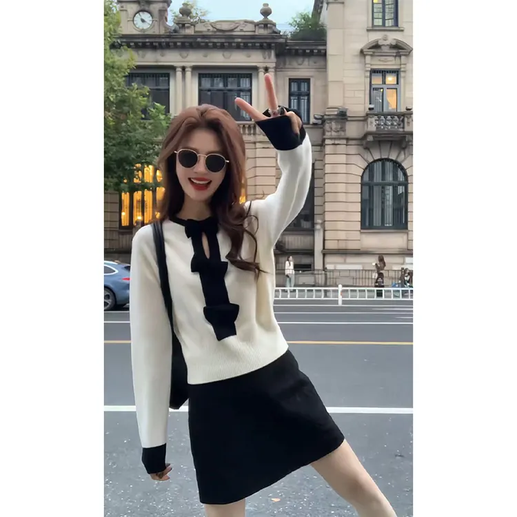 韩系减龄小香风蝴蝶结针织衫女2025秋冬黑白撞色收腰显瘦软糯毛衣