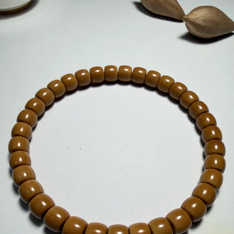 橄榄核尘三花料手串