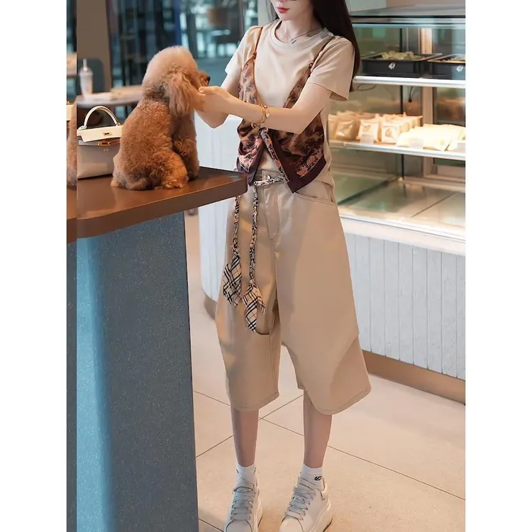 2025夏季新款女士假两件设计感吊带拼接短袖上衣七分休闲裤两件套