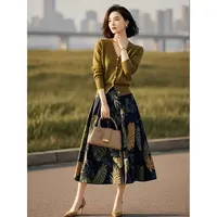今年流行的一整套针织套装2025女装新款开衫上衣印花半身裙两件套