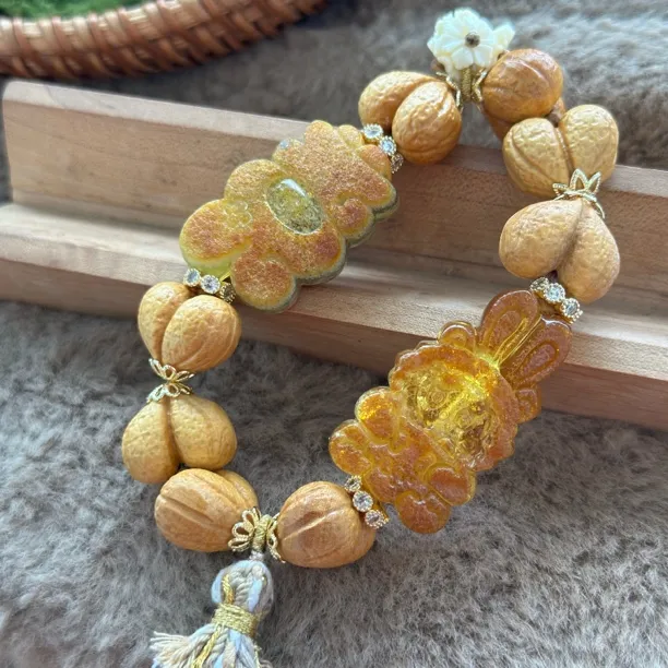 吉月蜜蜡拉布布美乐蒂蝴蝶结屁桃手串