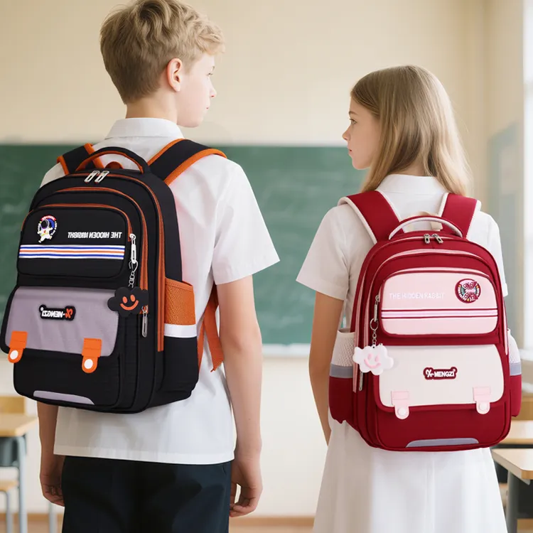 专柜新款小学生书包男孩女孩适用一二三到六年级减负双肩护脊防水