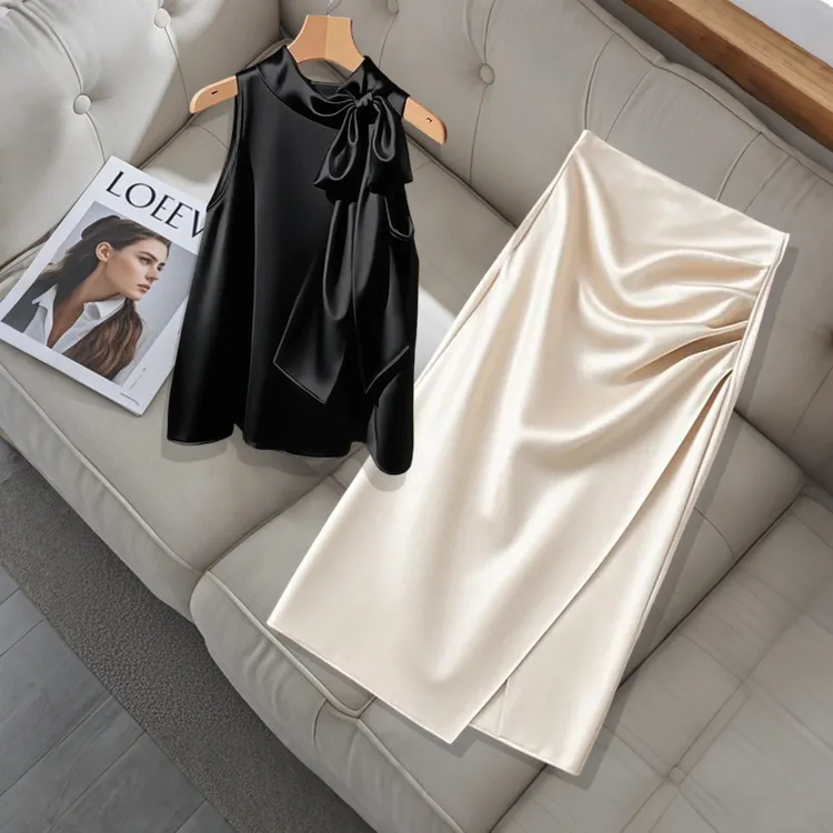 夏季气质温柔感套装黑色显瘦蝴蝶结无袖上衣时尚褶皱不规则半身裙