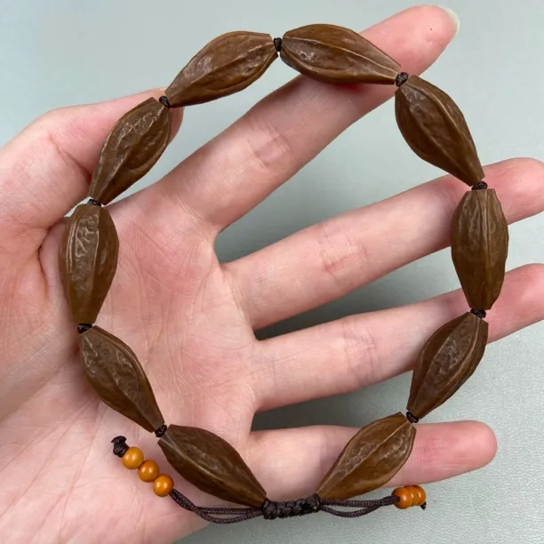 橄榄核小籽咖皮原生态三角核9颗0.7、0.8、0.9、男士女士橄榄核手串