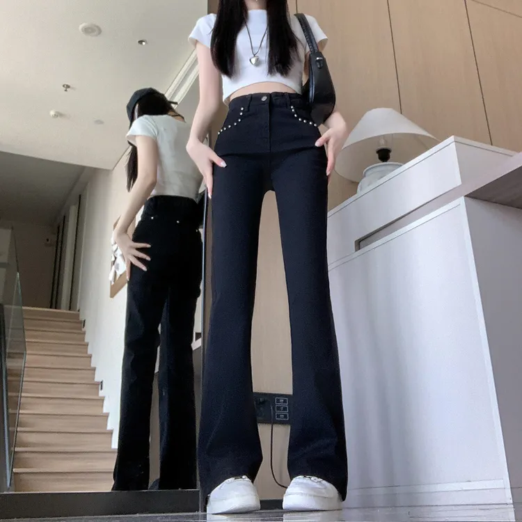 美式高腰铆钉微喇牛仔裤女秋季新款黑色显瘦直筒长裤子