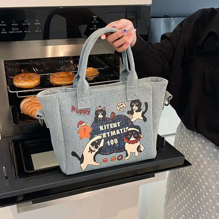 卡通牛仔布包包女2025新款潮时尚学院风手提托特包休闲大容量包