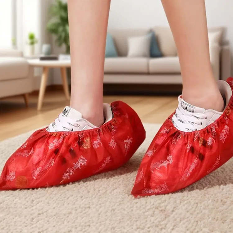 红色加厚一次性鞋套无纺布加厚防滑家用乔迁室内居家结婚耐磨脚套
