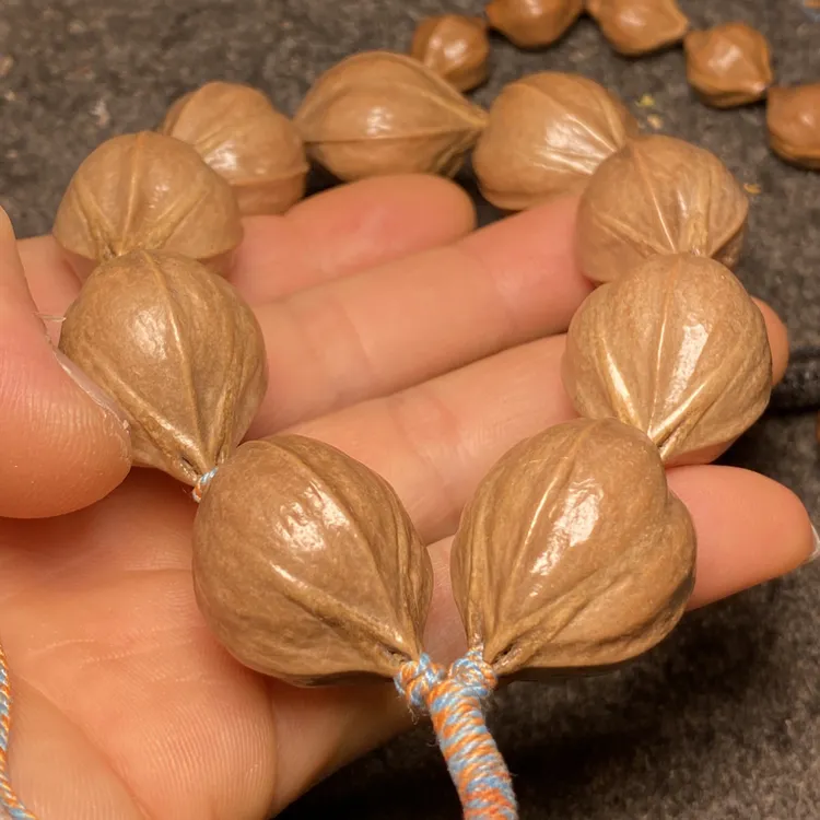橄榄核雕四花原皮梅林铁核福利圆手持素核素串