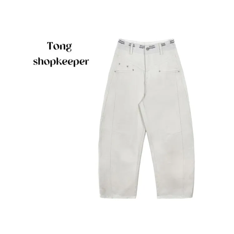 QJ/彤掌柜1681366 春季25重磅牛仔水洗字母拼接简约时尚牛仔裤