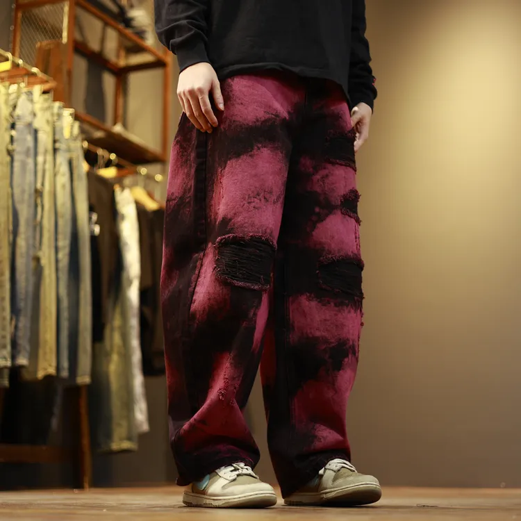 31078新款潮流个性宽松水洗粉黑假破洞弯刀牛仔裤