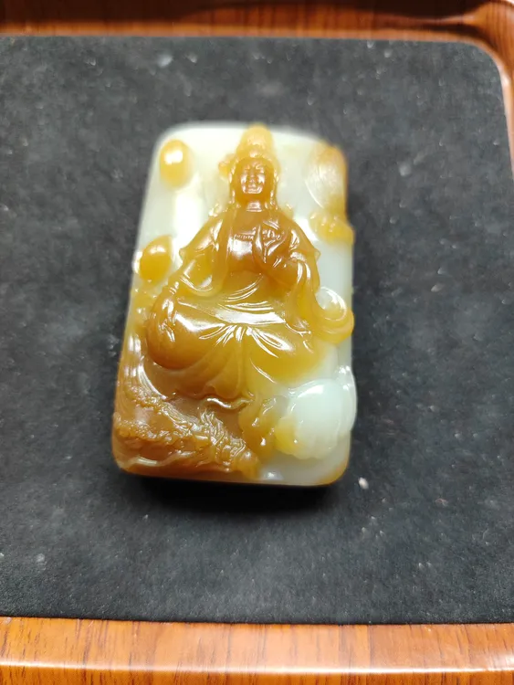 和田玉且末糖观音牌子
