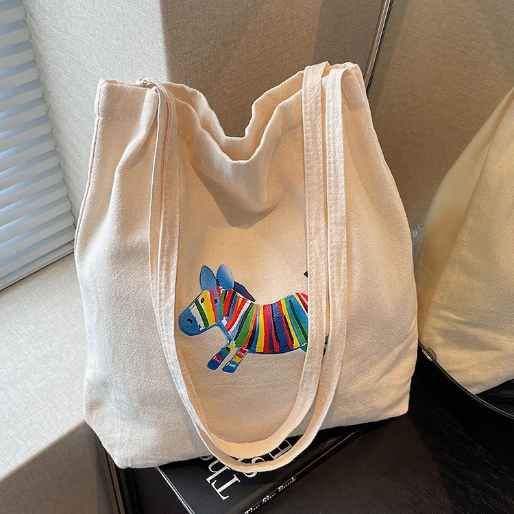 帆布包包女大容量2025新款可爱单肩学生上课手提腋下包通勤托特包
