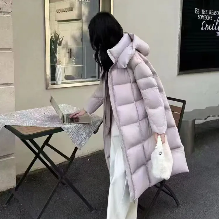 2025年冬季韩系长款90白鹅绒羽绒服女设计感小众洋气连帽加厚外套
