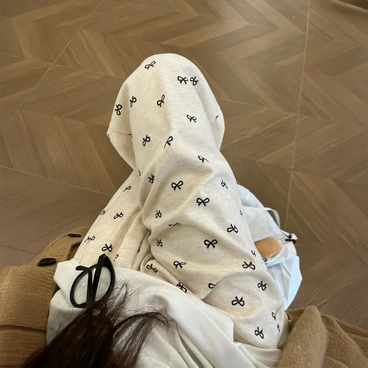 米杏色蝴蝶结糯米休闲裤女秋季新款胖妹妹mm梨形身材宽松阔腿裤子