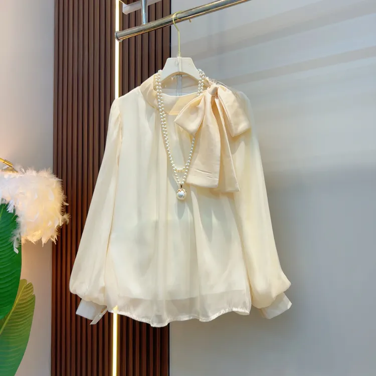 早春气质名媛风休闲甜美亮丽绑带蝴蝶结女人衫6216