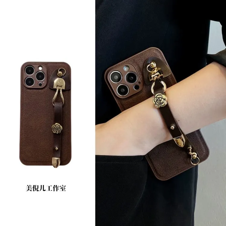 美拉德山茶花皮质腕带适用苹果1615promax手机壳1213pro斜挎14/11
