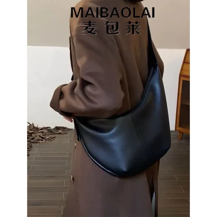 包包女式2025新款大容量黑色软皮饺子包轻奢小众高级感通勤斜挎包