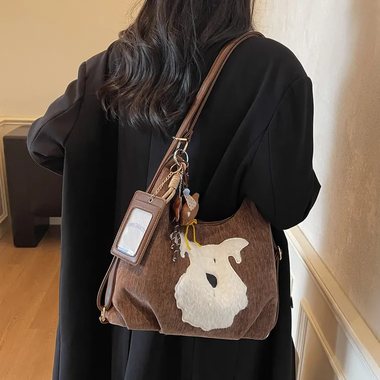 艾米兔女包2025新款拼接小狗双肩大容量纯色多用包质感通勤单肩包