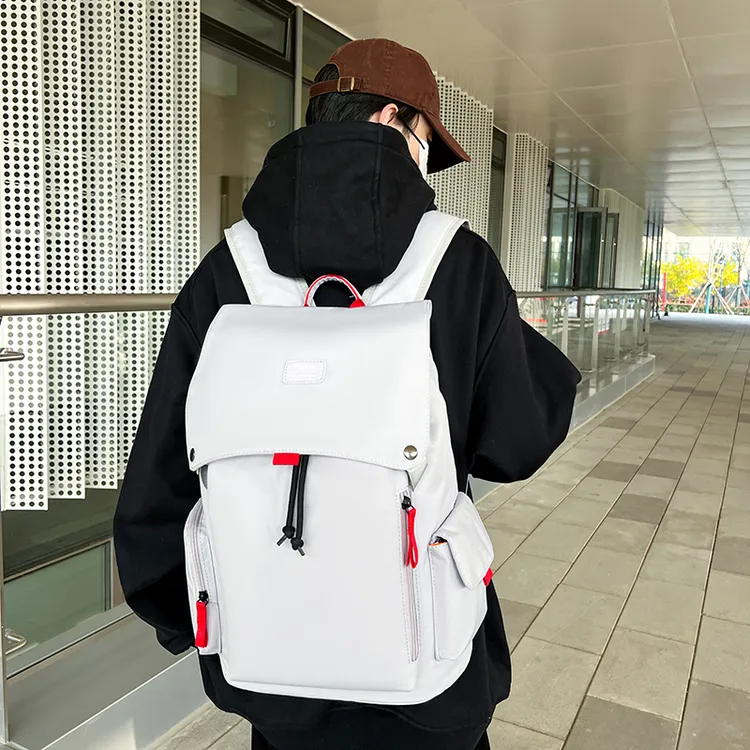 耐磨防水双肩包2025新款帅气初中生书包大学生高中大容量旅行背包