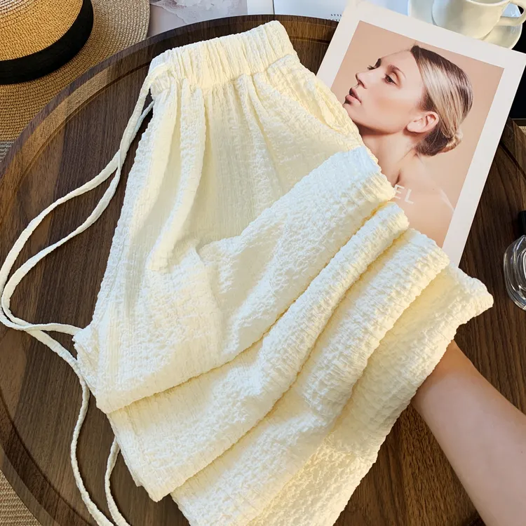 米色薄款立体工艺泡泡邹时尚带松紧腰裤子阔腿裤女夏季新款休闲裤