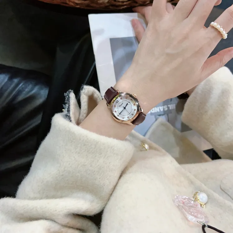 Dinimi新款简约镶钻精致告白气球气质百搭轻奢防水手表女腕表女款