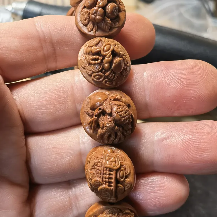 龙纹桃核纯手工雕刻多宝12颗手串