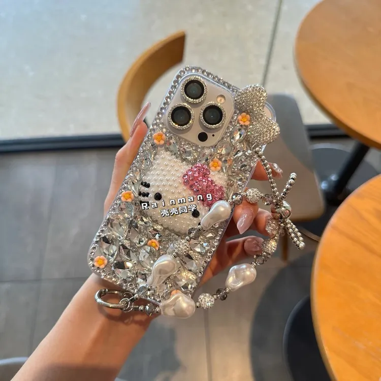 满钻KT猫蝴蝶结适用于iPhone16ProMax适用于苹果15手机壳14/13/12