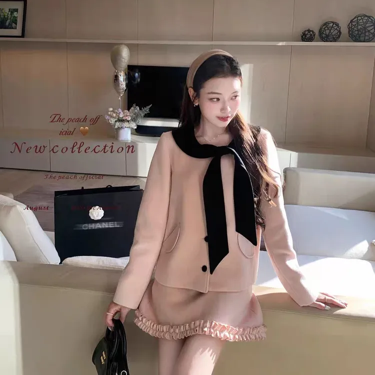海德堡甜美蜜桃粉大衣+温柔显瘦半身短裙